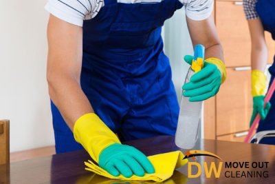 professional-cleaner-wiping-the-table-7-key-reasons-professional-move-out-cleaning-services-help-to-save-money-move-out-cleaning-dw-move-out-cleaning-singapore