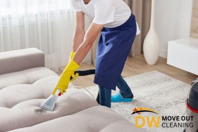 vacuuming-the-sofa-7-things-to-do-before-hiring-a-professional-move-out-cleaning-service-in-singapore-move-out-cleaning-dw-move-out-cleaning-singapore